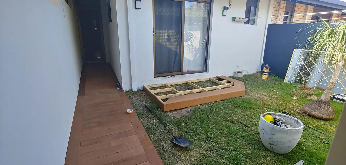 Timber subframe for a small step deck next to a finished walkway
