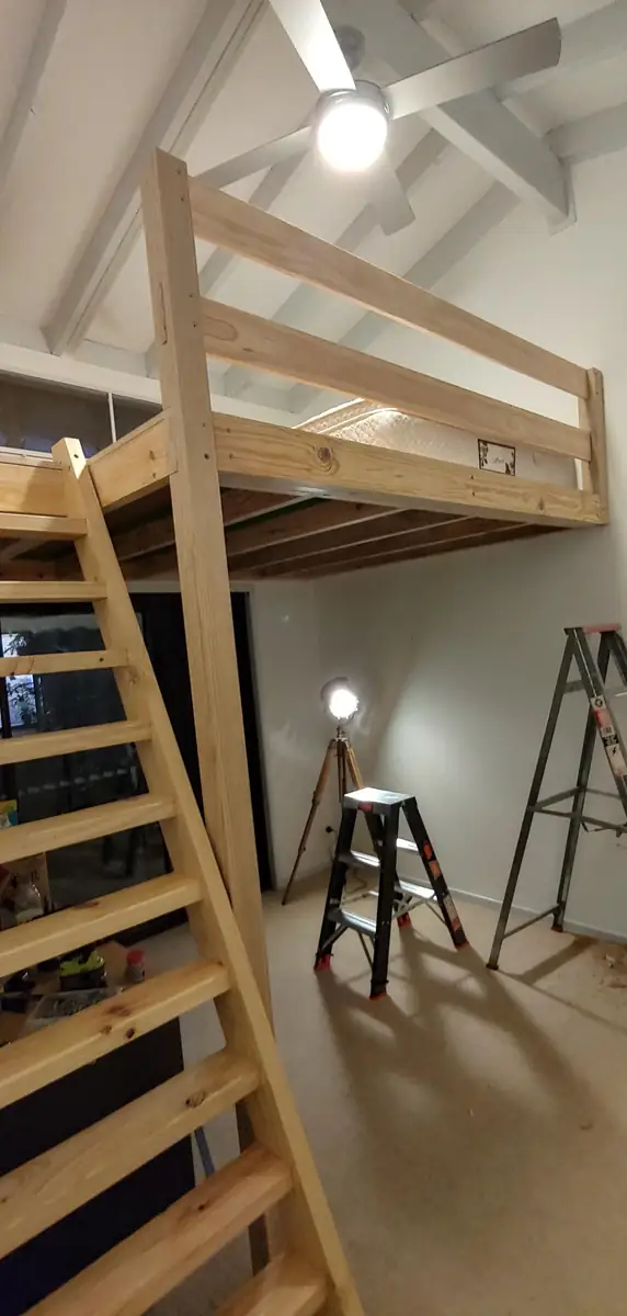Loft bedroom with timber balustrade, ready for the mattress