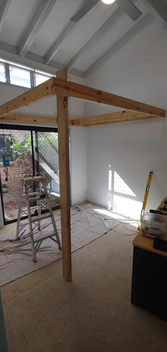 Timber post and beam frame for the loft going up