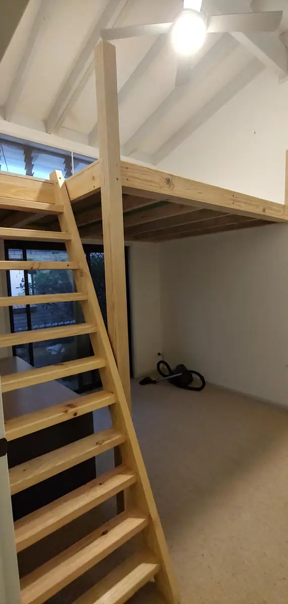 Finished loft with timber staircase