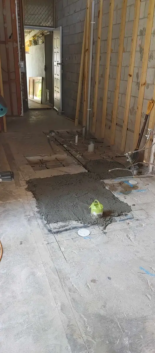 New concrete spread and levelled in the cut-out slab