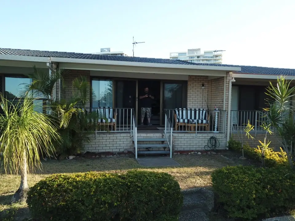 Before: the old brick patio and steel rails