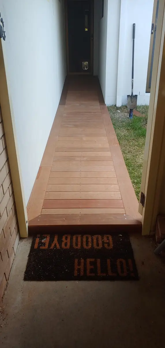 Finished hardwood walkway with a picture-framed border